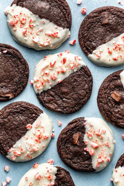 peppermint chocolate cookies dipped in white chocolate with crushed peppermint added on top.