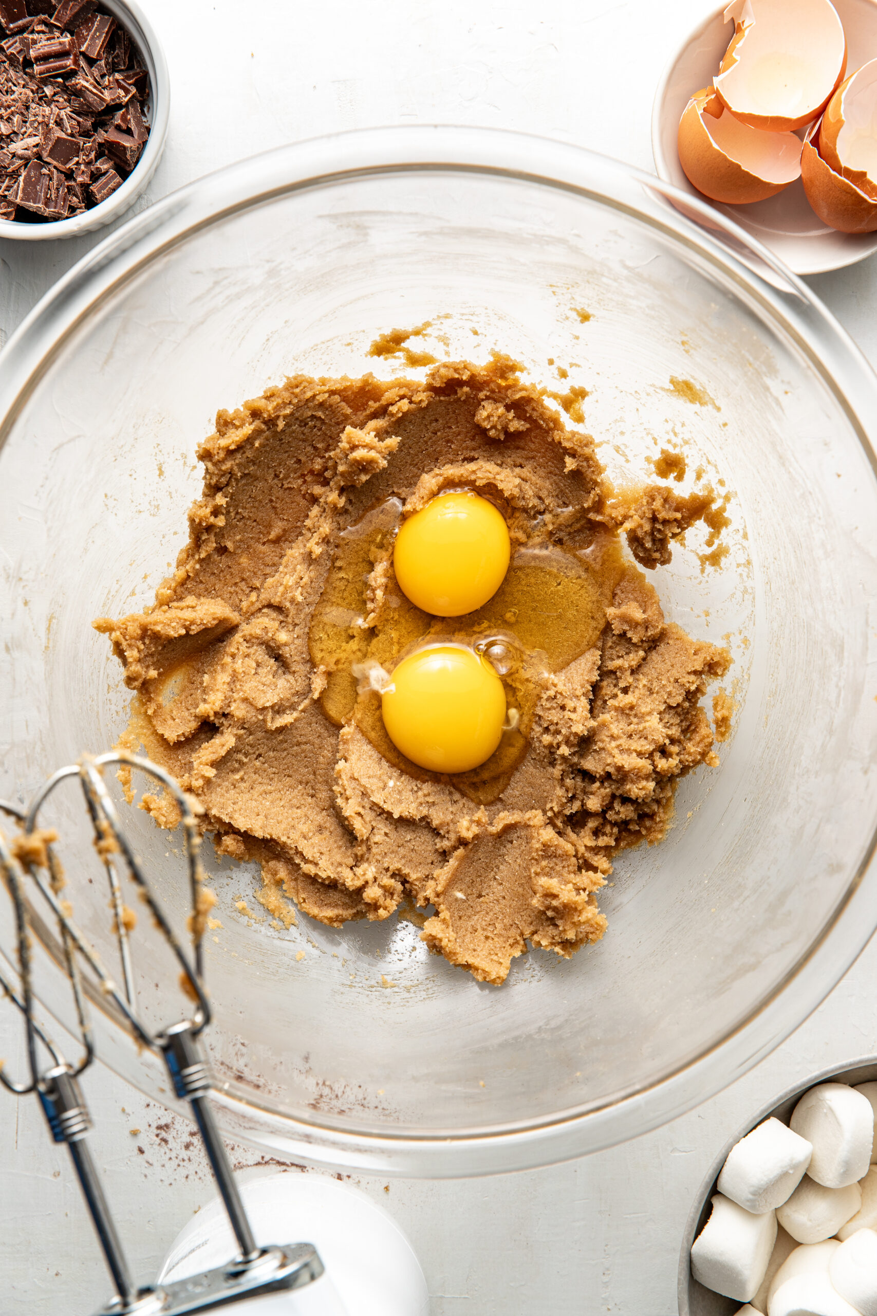 eggs added to creamed butter and sugar in a mixing bowl