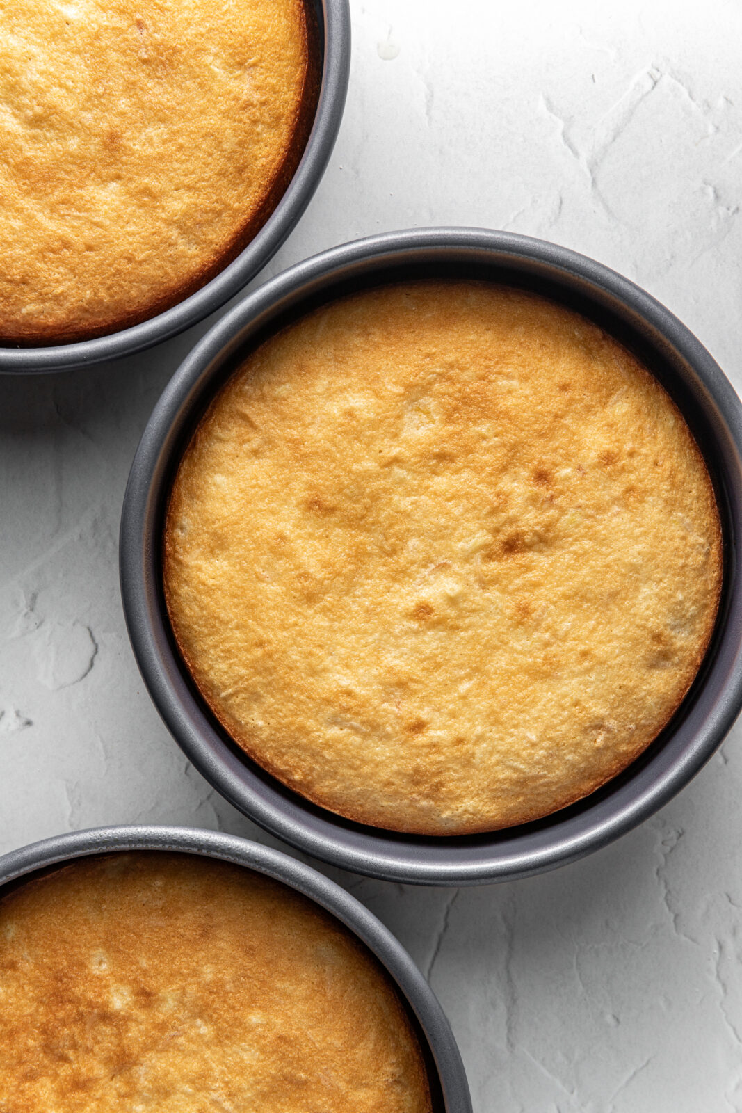 3 pans of baked pineapple coconut cake