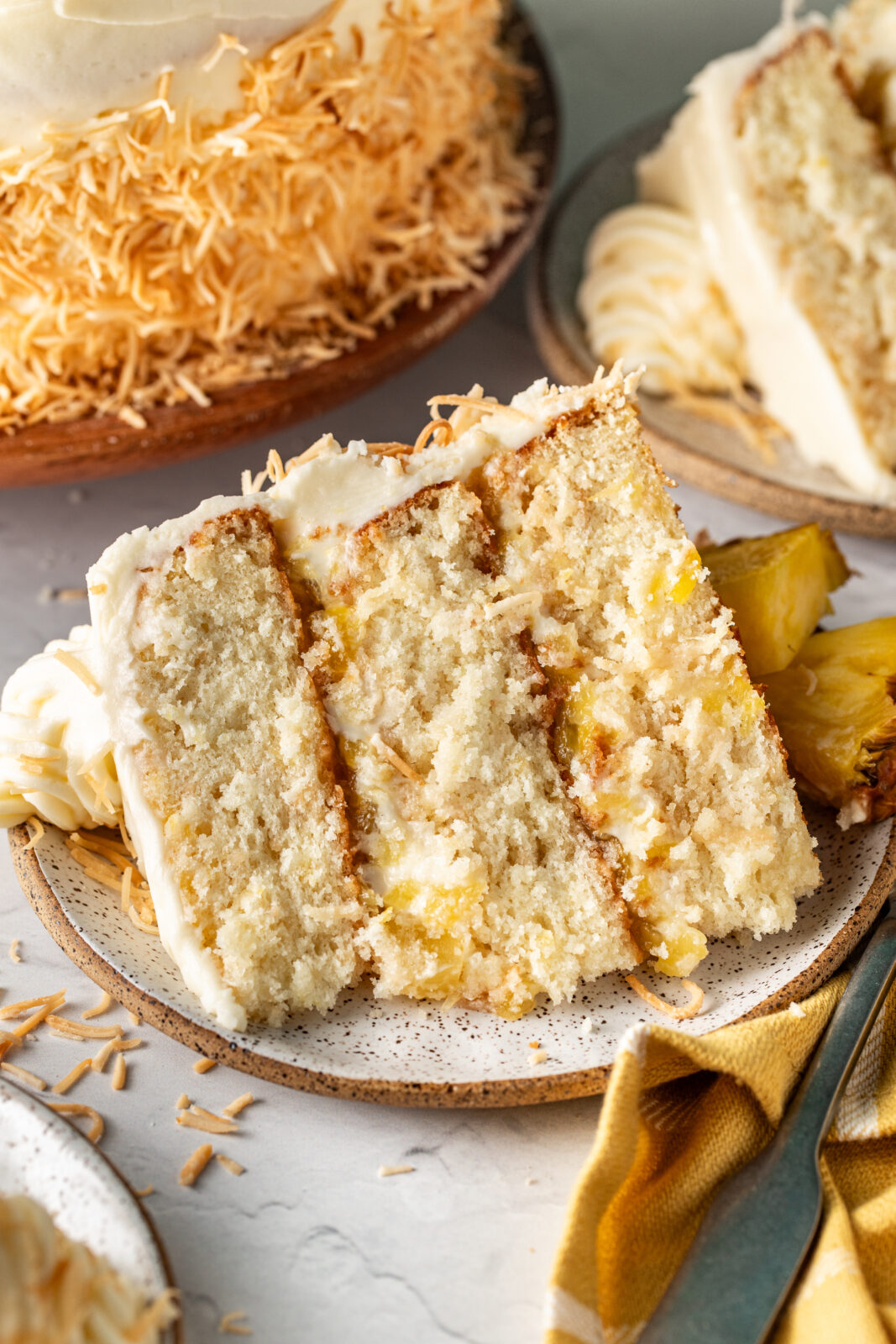 slice of pineapple coconut cake