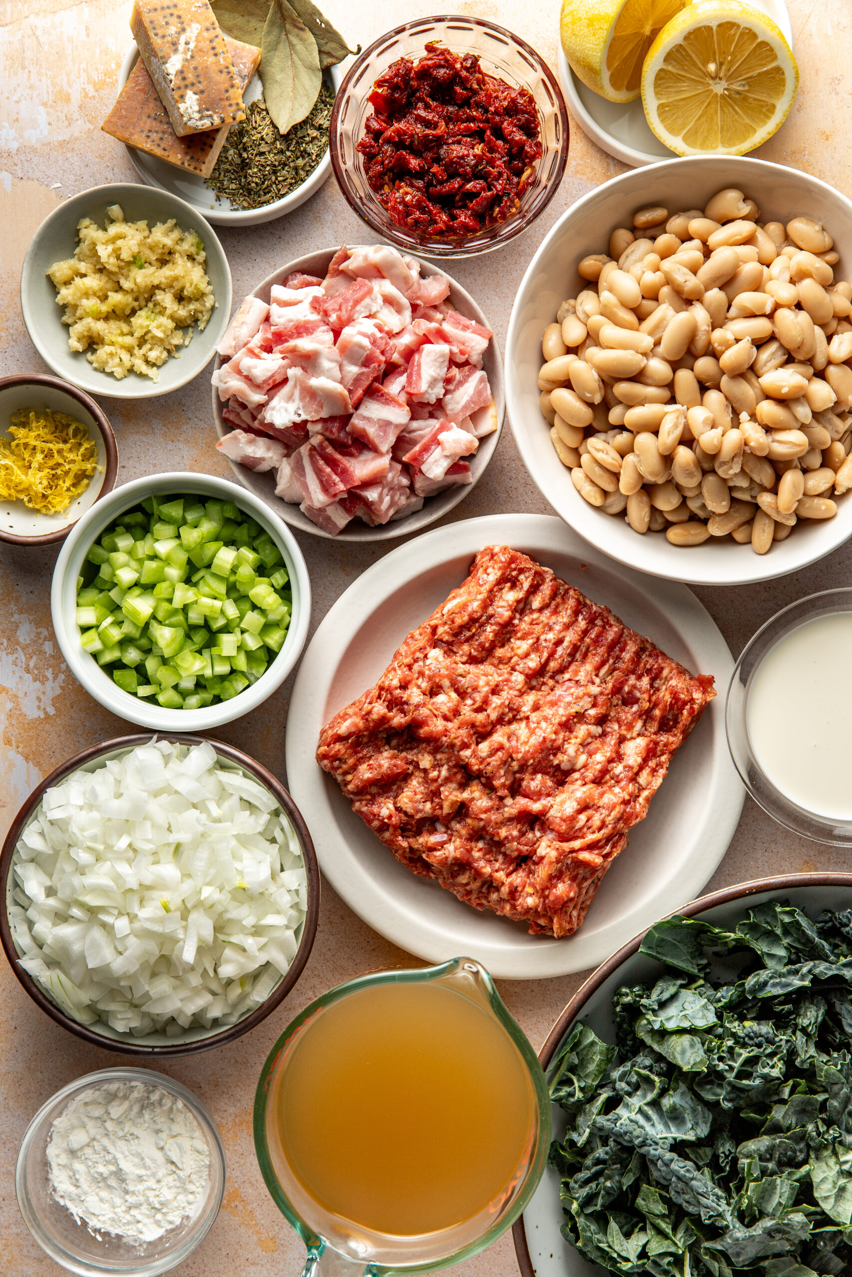 ingredients for creamy White Bean and Sausage Kale Soup