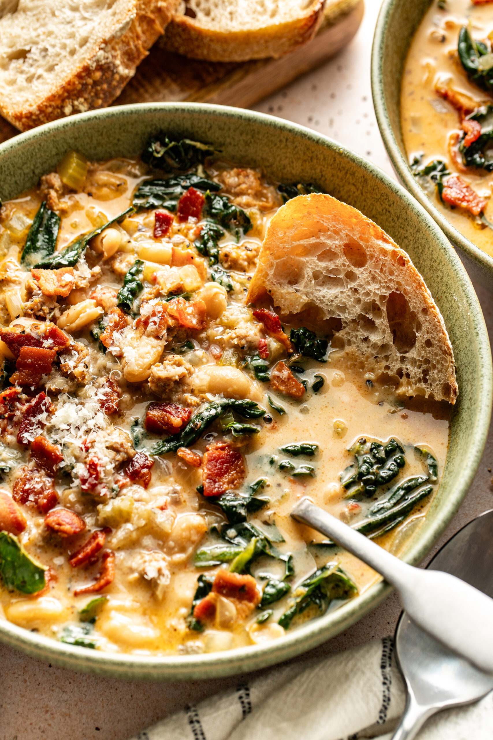 bowl of creamy White Bean and Sausage Kale Soup