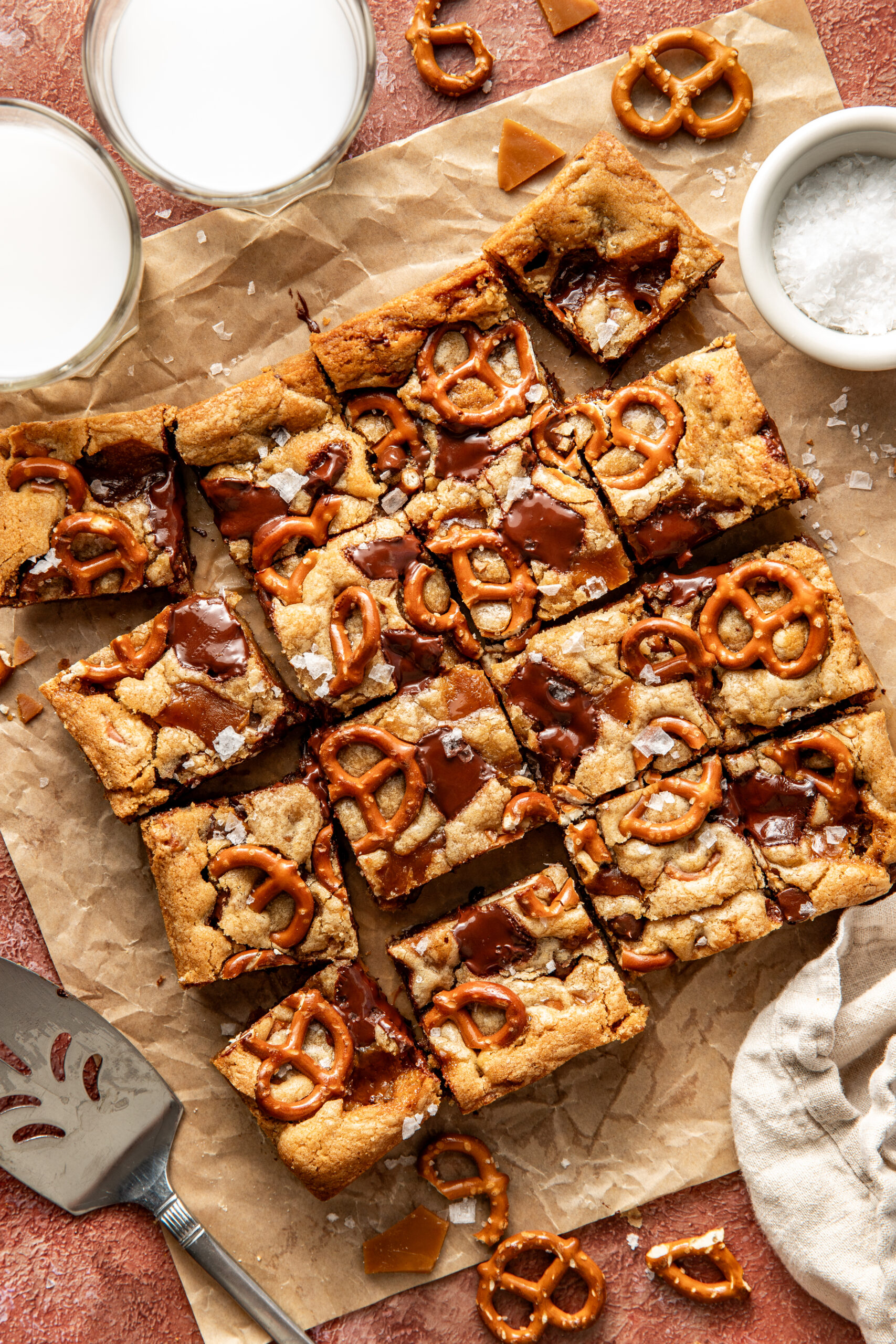 cut blondies on parchment paper