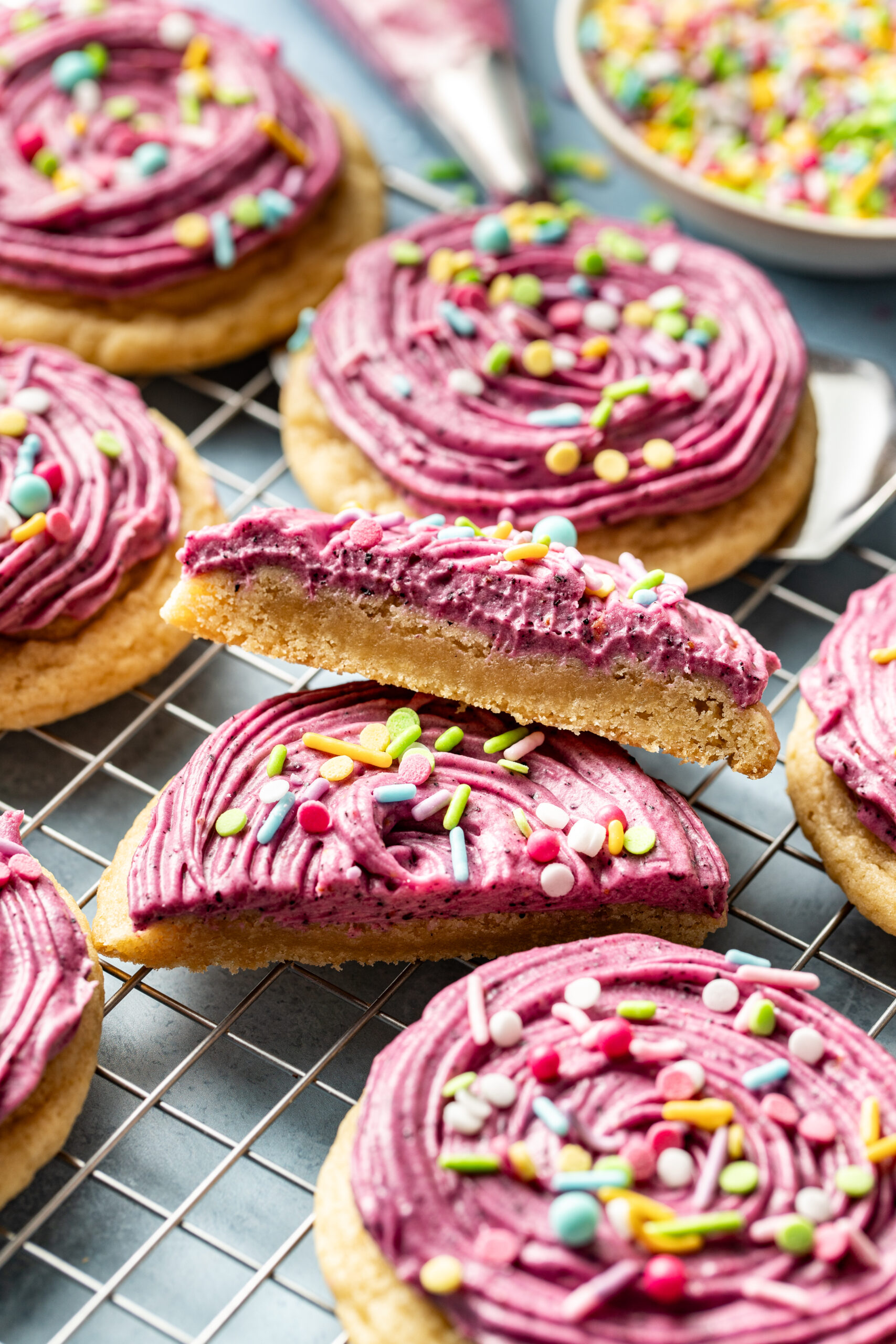 frosted sugar cookies with blueberry cheesecake frosting