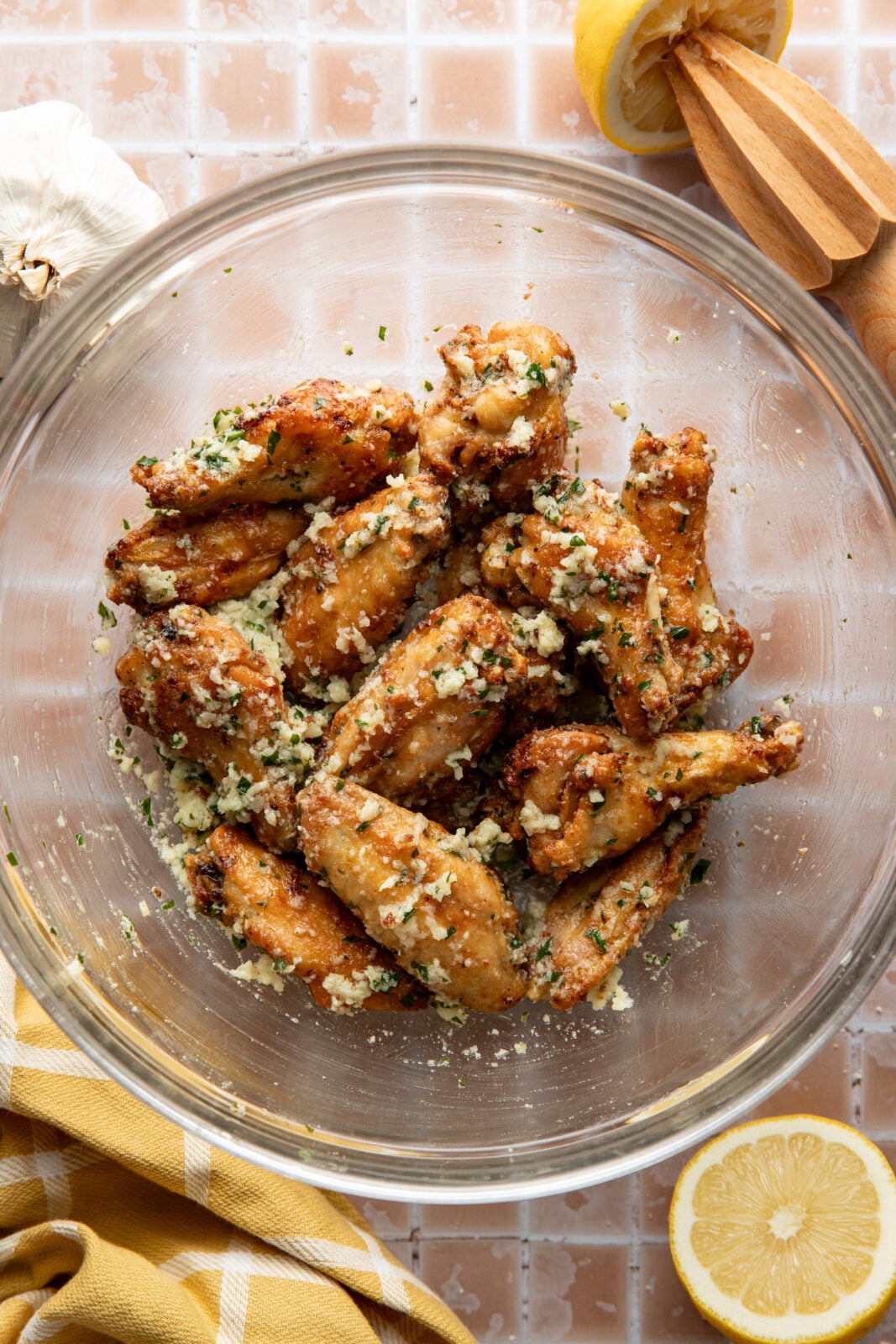 garlic parmesan wings tossed in sauce and cheese