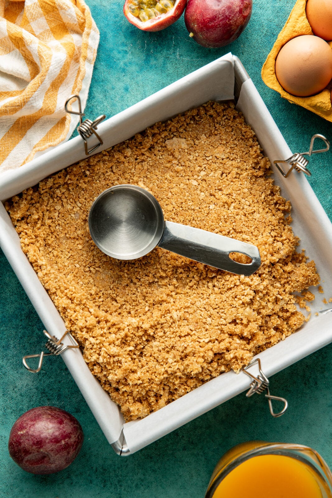 press crust mixture in the baking sheet
